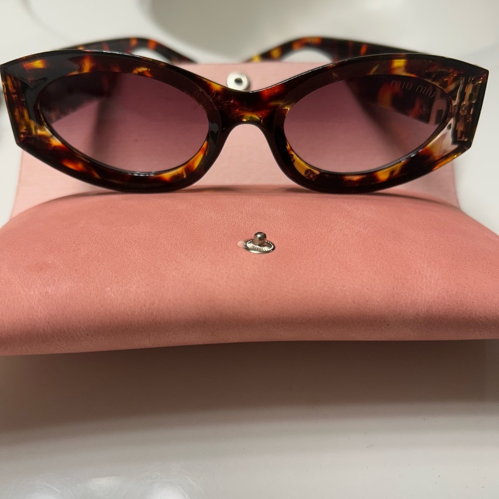 Miu Miu Tortoise Shell Sunglasses
